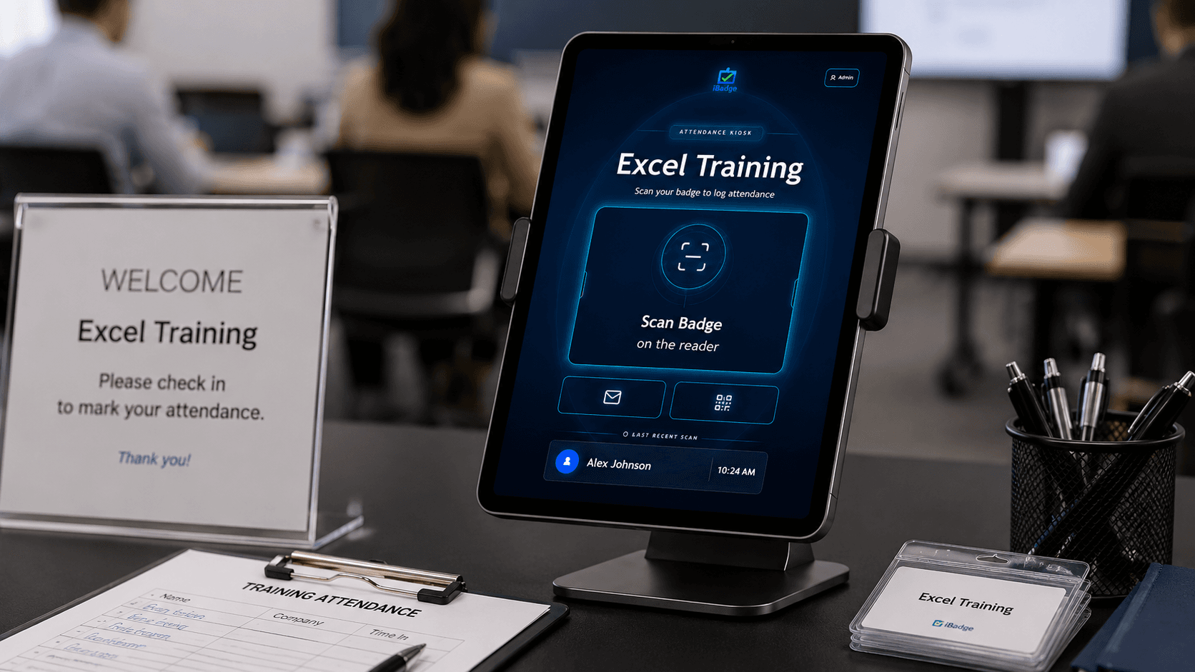 Attendi kiosk on a tablet stand at a training check-in desk, showing Scan Badge on the reader